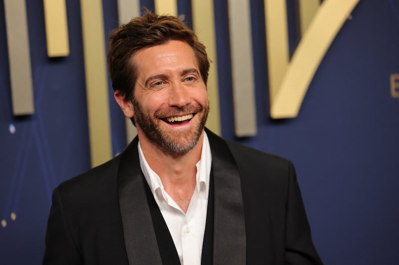 Jake Gyllenhaal poses on the red carpet at the 77th Primetime Emmy Awards in Los Angeles, California