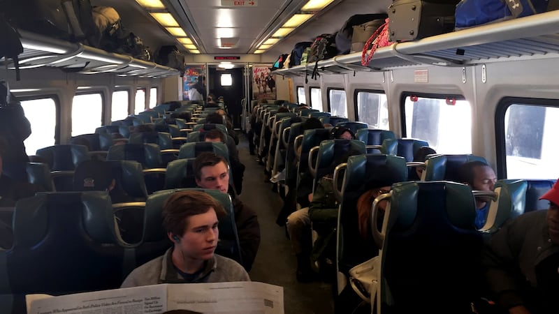 Commuters ride in the front car of a southbound Metropolitan Transportation Authority (MTA) Metro North Railroad as it travels near Valhalla, New York February 5, 2015. Train service was resumed Thursday after a north bound commuter train that had hit a car at the Commerce Road crossing in Valhalla killed six people Tuesday evening. (UNITED STATES - Tags: DISASTER TRANSPORT)