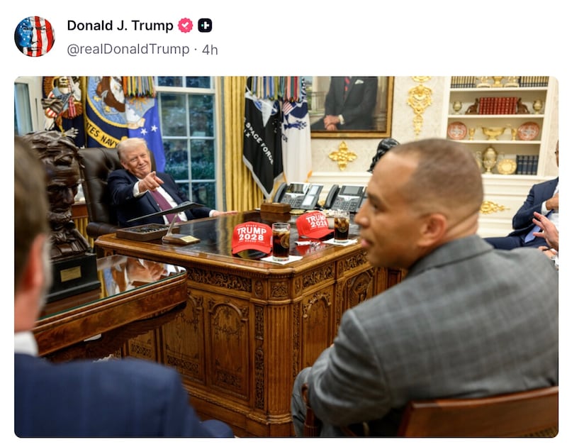 Donald Trump points at Hakeem Jeffries in the Oval Office.