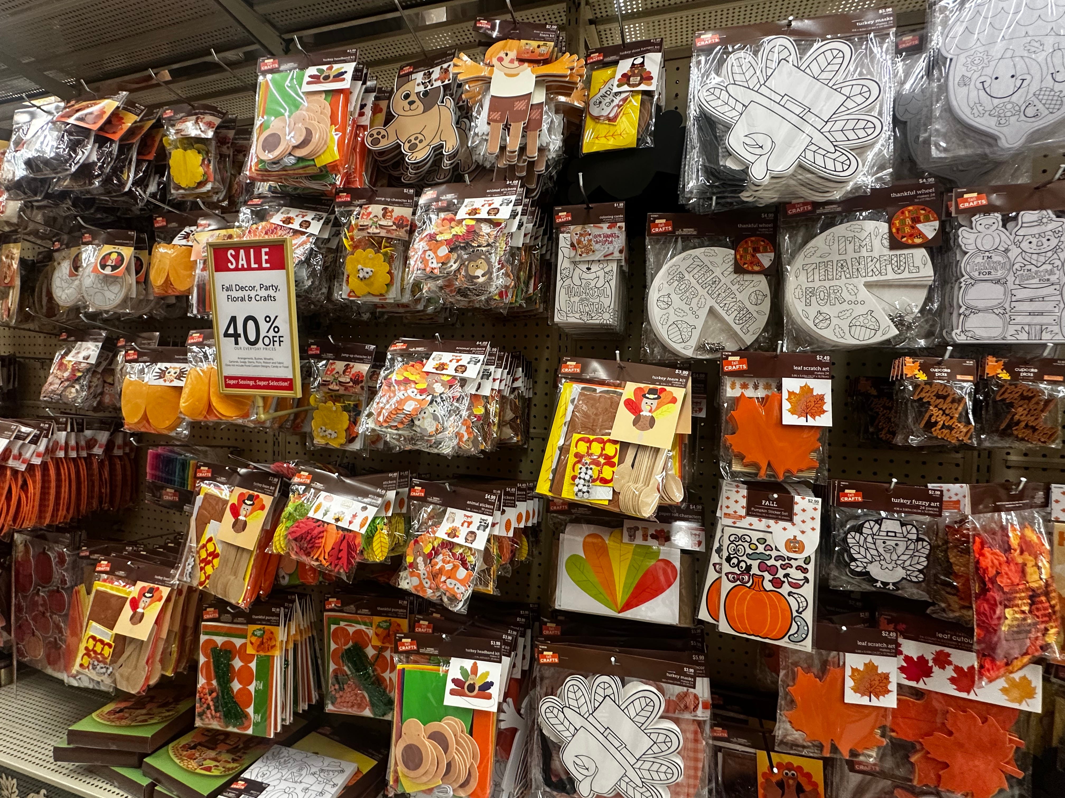 Thanksgiving-themed craft kits in Hobby Lobby aisle