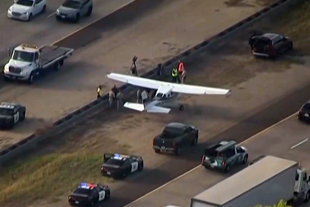 The plane touched down on I-15 around 4:45 p.m. Monday.