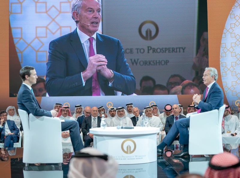 MANAMA, BAHREIN - JUNE 26: Former British Prime Minister Tony Blair (R) and  Jared Kushner (L), U.S. President Donald Trumps senior White House adviser and son-in-law  attend U.S.-led workshop in Manama, Bahrain on June 26, 2019.  U.S.-led conference opened in Bahrain on Tuesday, during which U.S. officials are expected to unveil the economic portion of the American back-channel Middle East peace plan known as "deal of the century". 

 (Photo by BNA - Pool/Anadolu Agency/Getty Images)