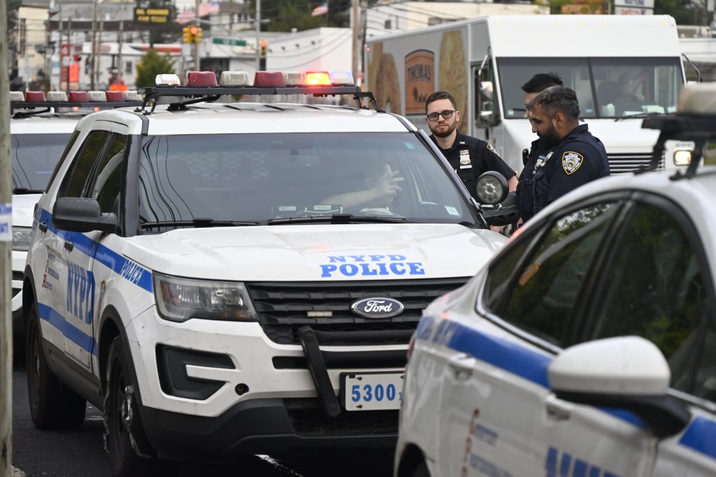 NYPD officers including the medical examiner and crime scene unit work at the scene, collected evidence and dig at the site where skeletal remains consisting of a skull and other bones at 134-01 20th Avenue in College Point, Queens, New York, United States on Tuesday, September 30, 2025.