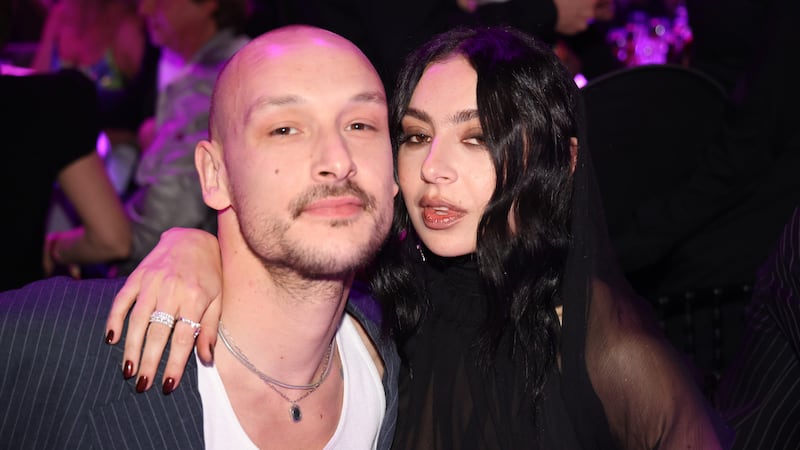 LONDON, ENGLAND - MARCH 01: (EDITORIAL USE ONLY) George Daniel and Charli XCX during The BRIT Awards 2025 at The O2 Arena on March 01, 2025 in London, England.