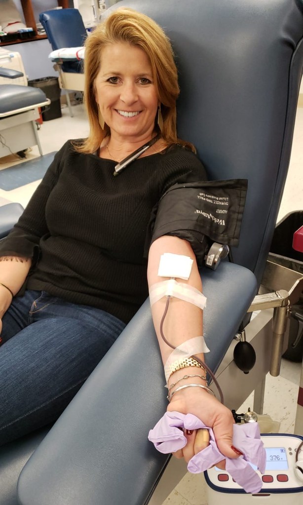 Linda Murphy donating blood.