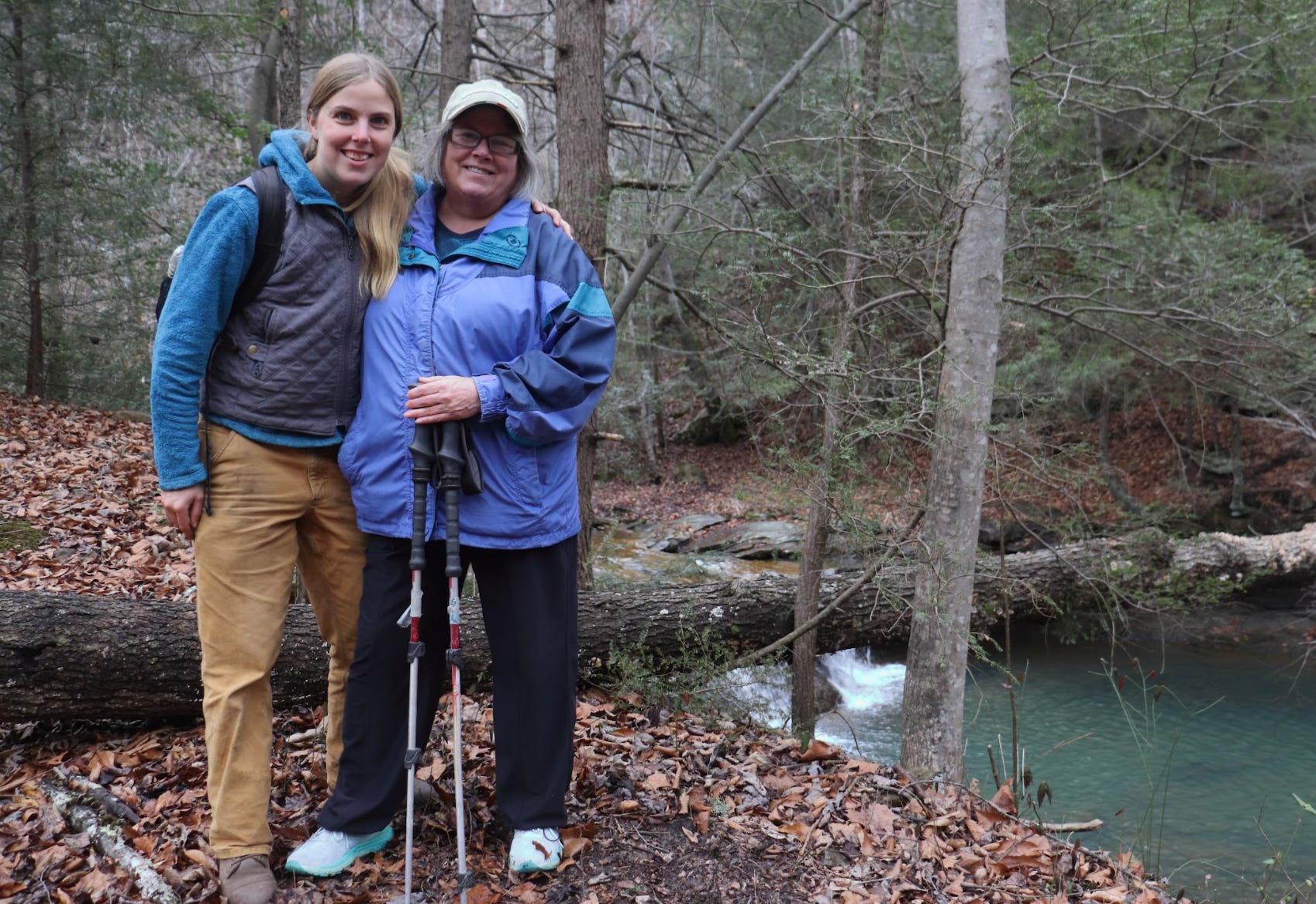 The writer with her mom in the woods.