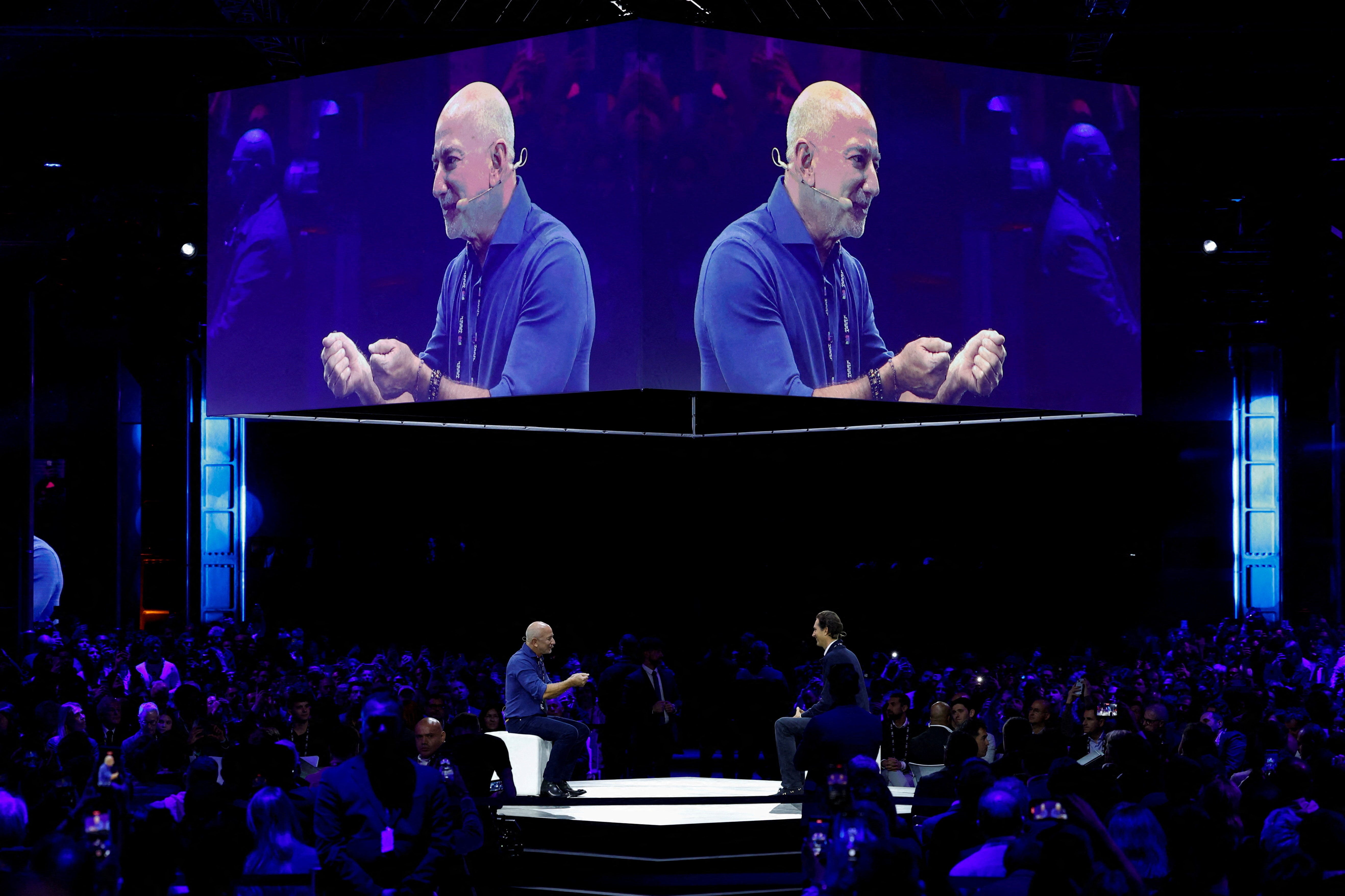 Amazon founder Jeff Bezos speaks at the main panel of Italian Tech Week 2025 with Ferrari, Stellantis Chairman, and Exor CEO John Elkann, in Turin, Italy, on October 3, 2025.