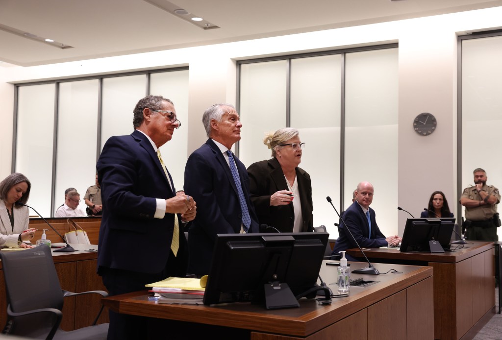 Defense attorneys Richard G. Novak, Michael N. Burt, and Kathryn Nester at a waiver hearing in Utah County Court.