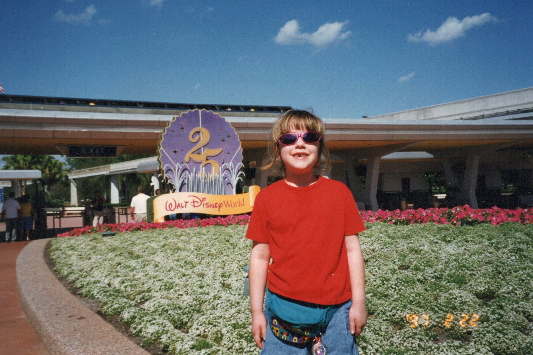 The author poses outside of Walt Disney World in 1997.