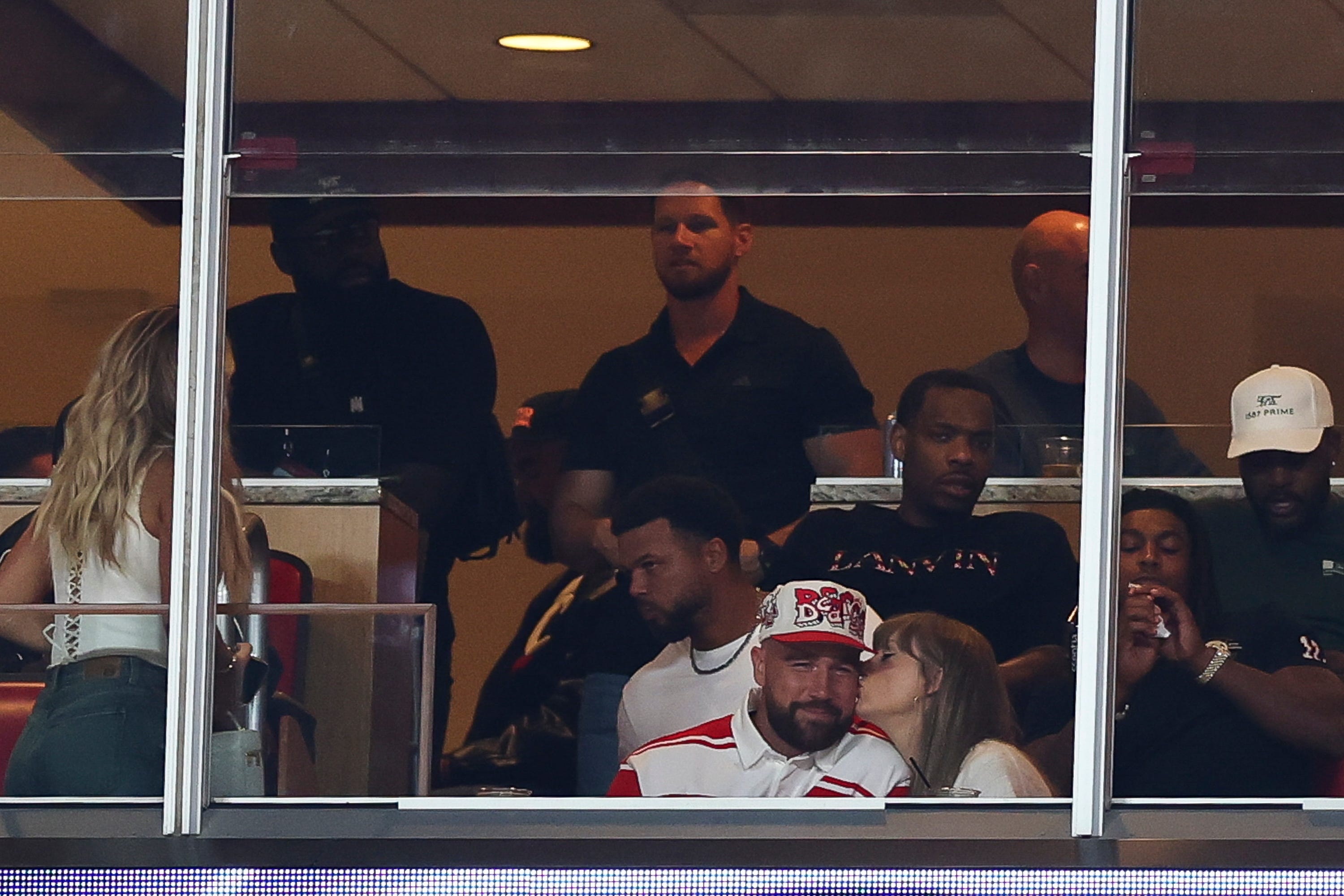 Travis Kelce and Taylor Swift watch the Nebraska Cornhuskers play the Cincinnati Bearcats at Arrowhead Stadium on August 28, 2025.