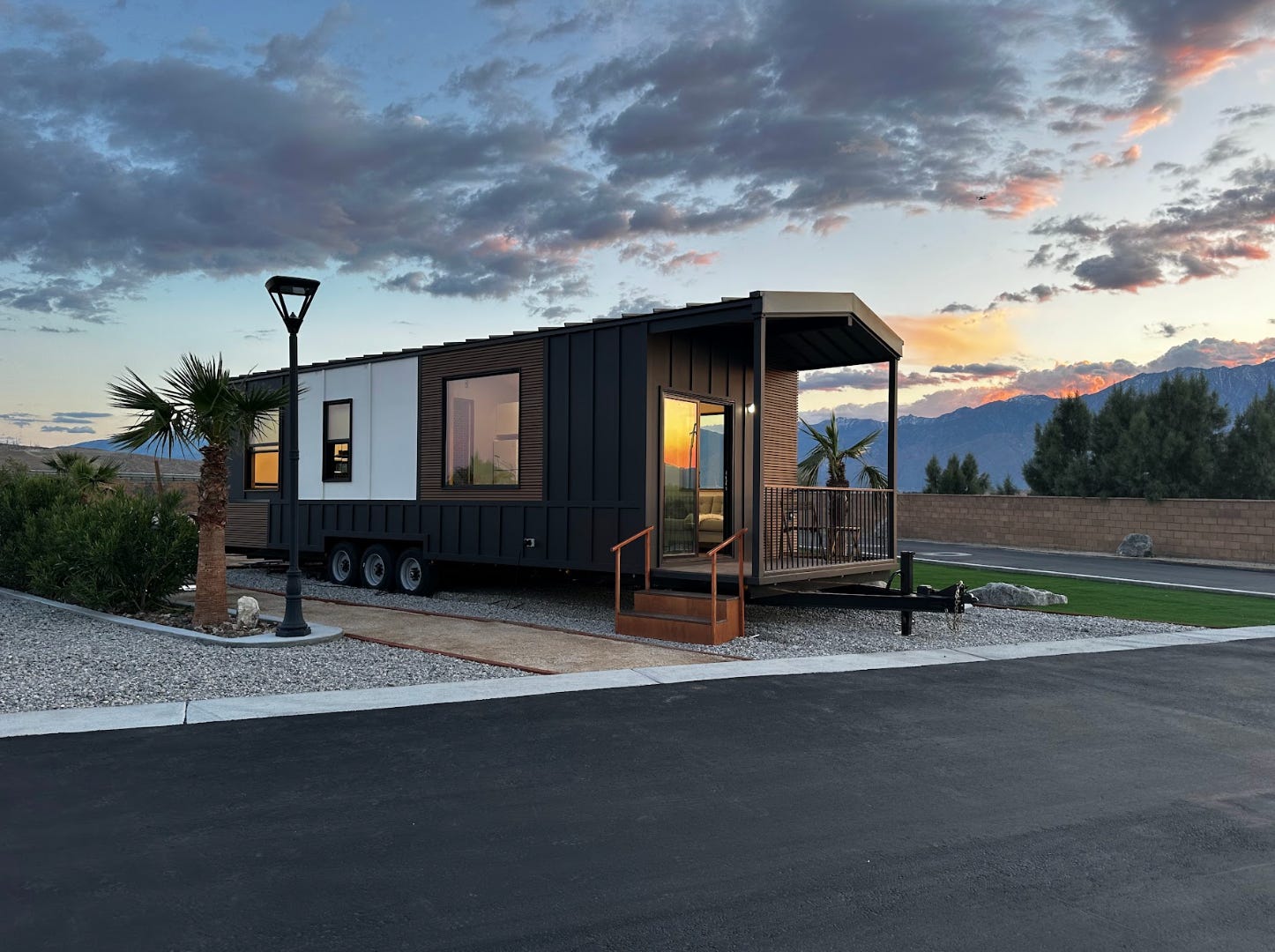 The exterior of a tiny home on wheels manufactured by Clever Tiny Homes.