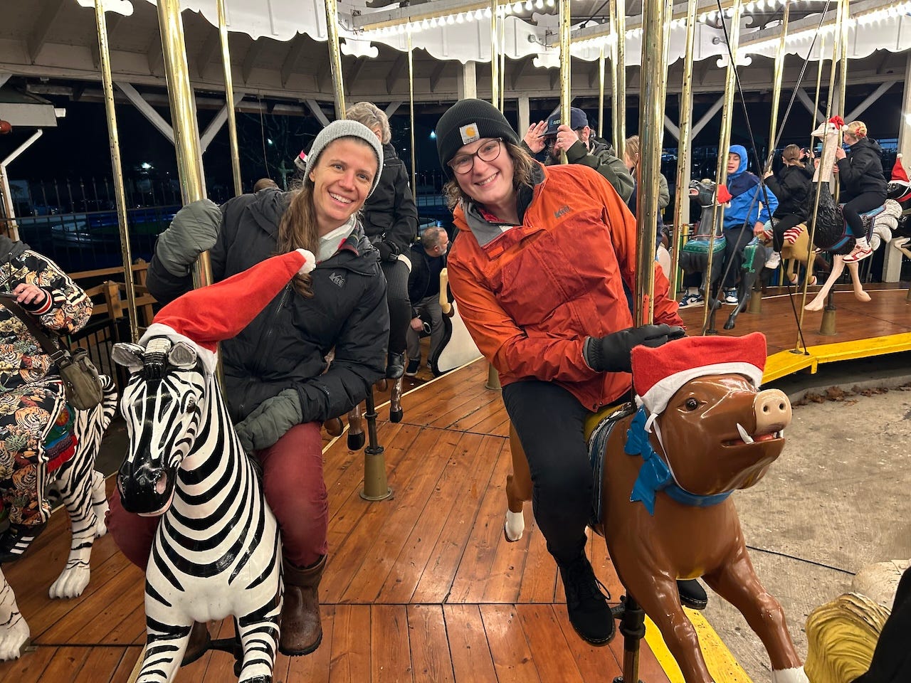 Emilie Karas (right) and her wife, Ellie Johnson, have three roommates in their six-bedroom house and four tenants in their tiny home on wheels and two ADUs.