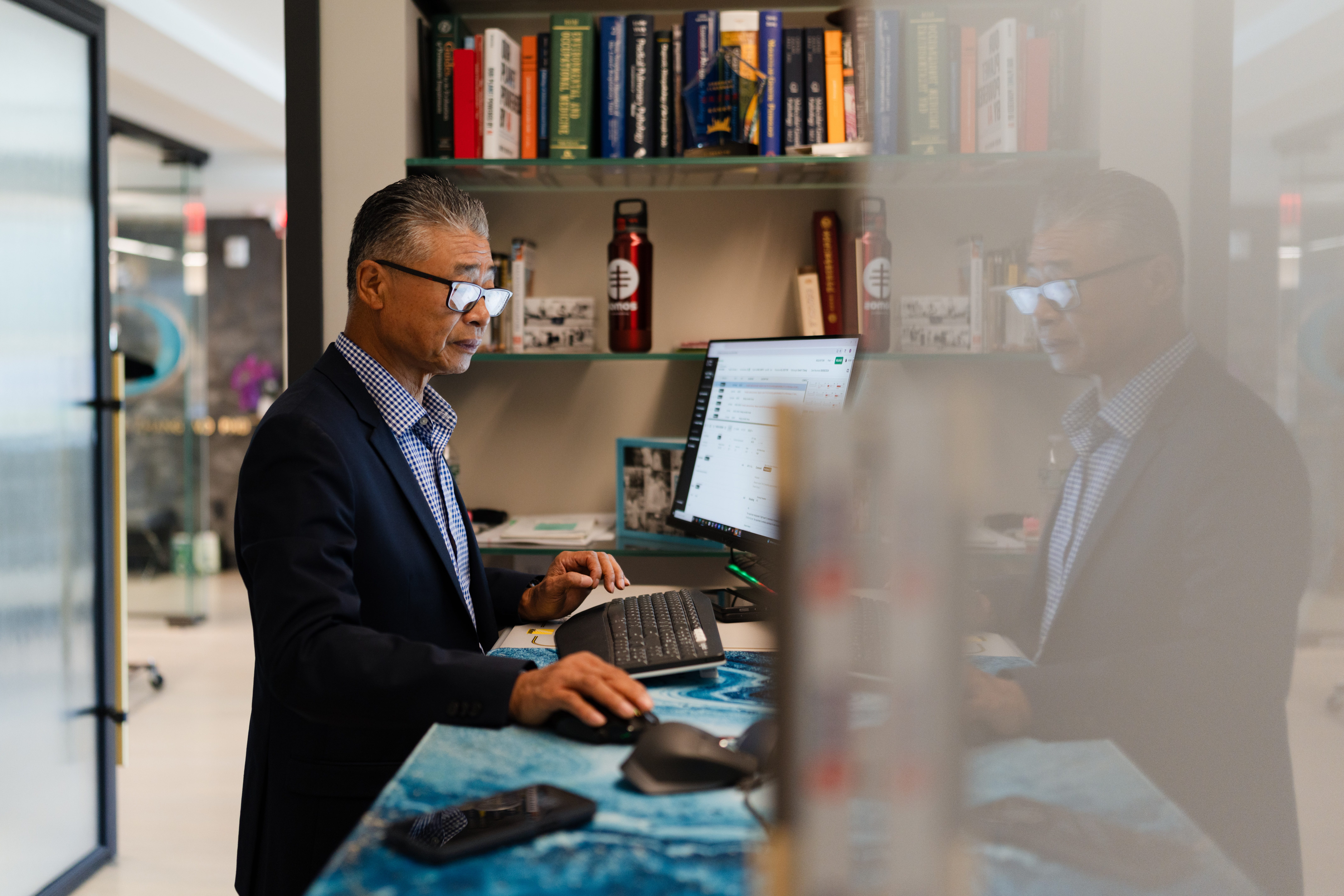 Dr David Zhang at the computer