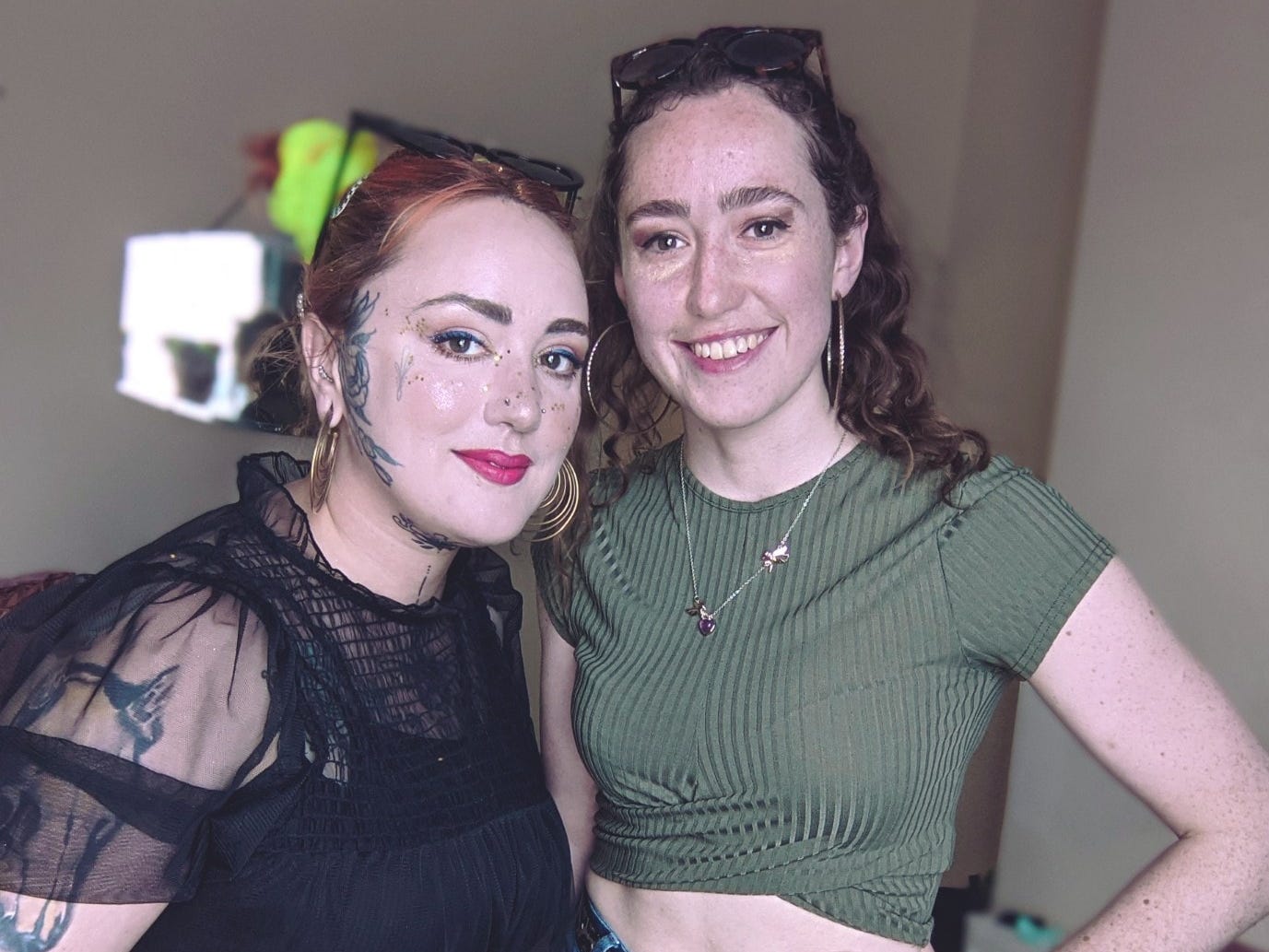 Two female friends standing together