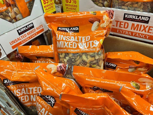 Kirkland Signature unsalted mixed nuts bags  on display at Costco