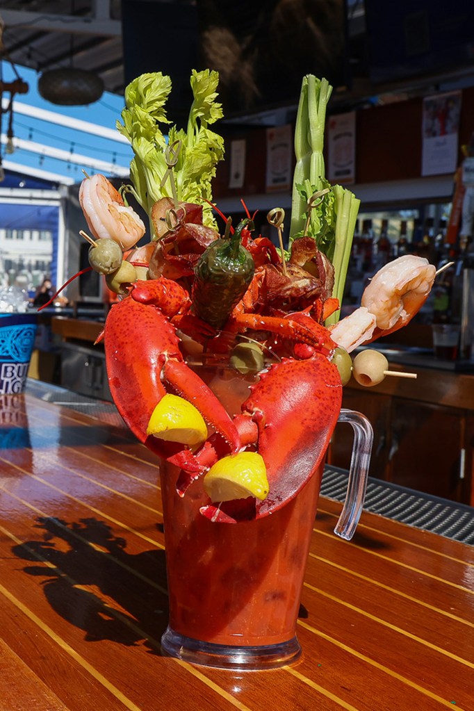 A $120 lobster Bloody Mary with lobster, shrimp, olives, lemon, and celery.