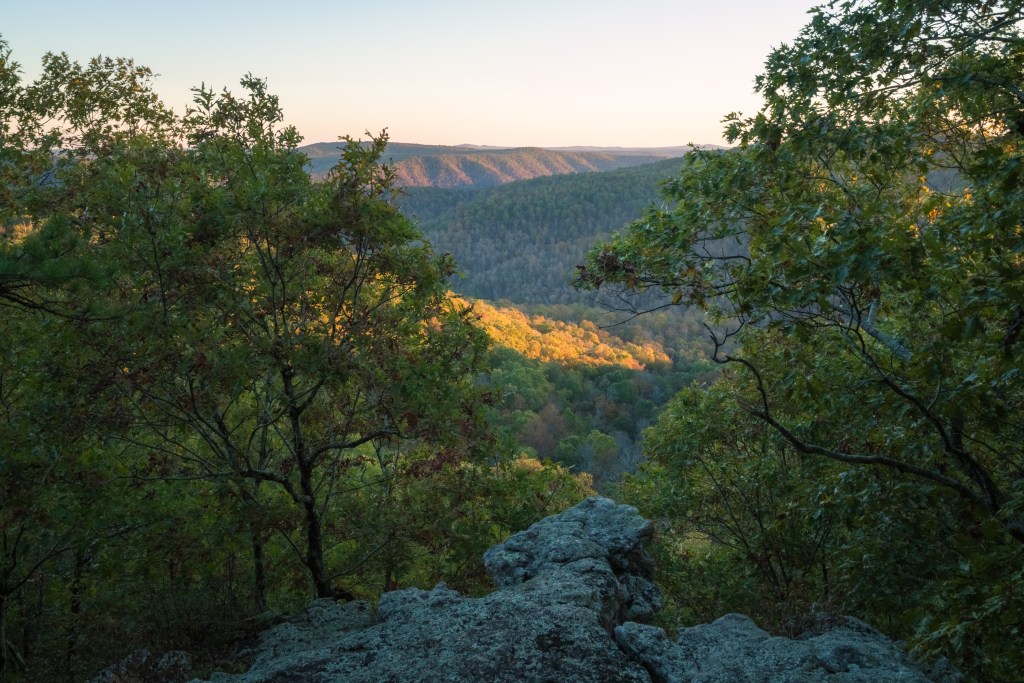 Sunset view overlooking hills and forests in Arkansas.