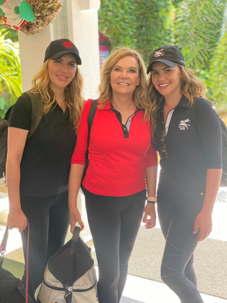 Renee Brinkerhoff and her daughters, Christina and Juliette, smiling at the camera.
