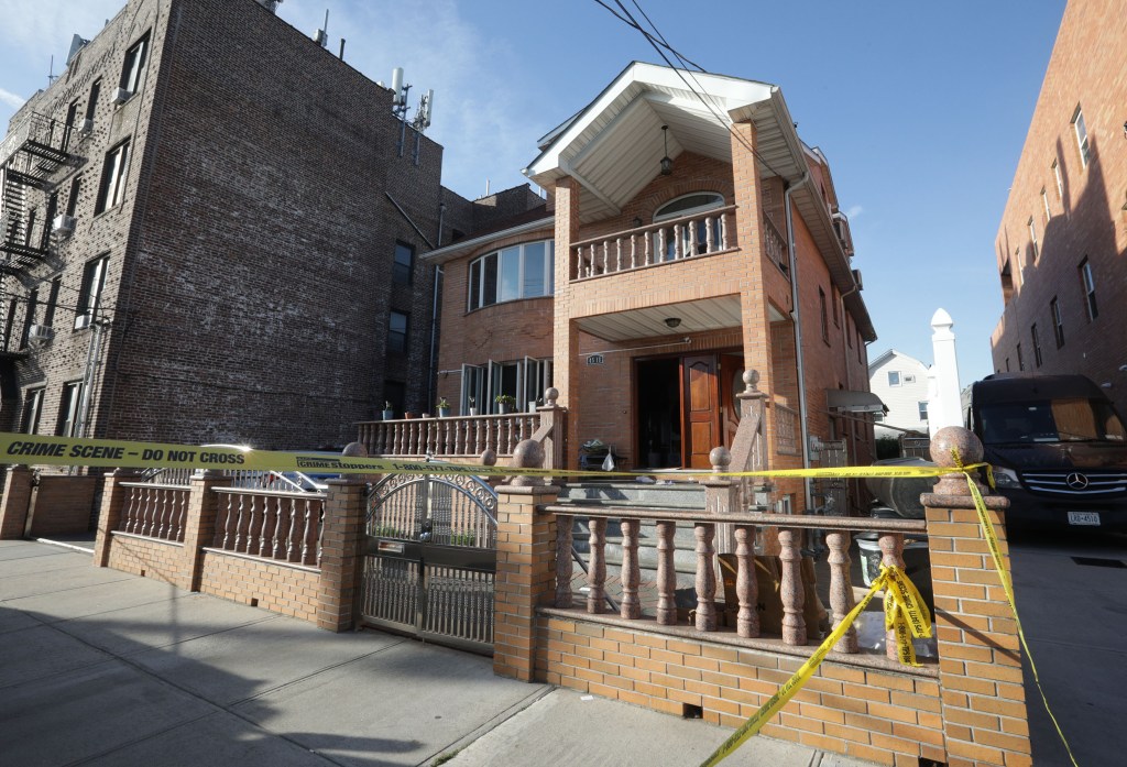 The real estate at 45-18 Smart Street in Queens, NY, surrounded by yellow crime scene tape.