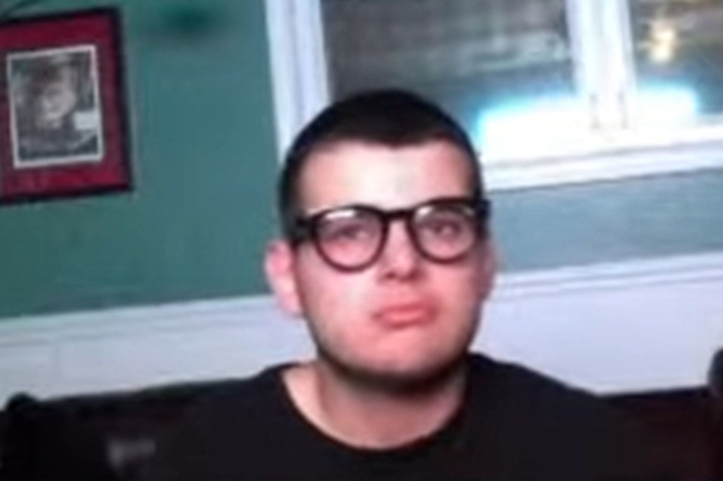 Vincent P. Battiloro in glasses.