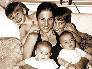 Woman with four boys
