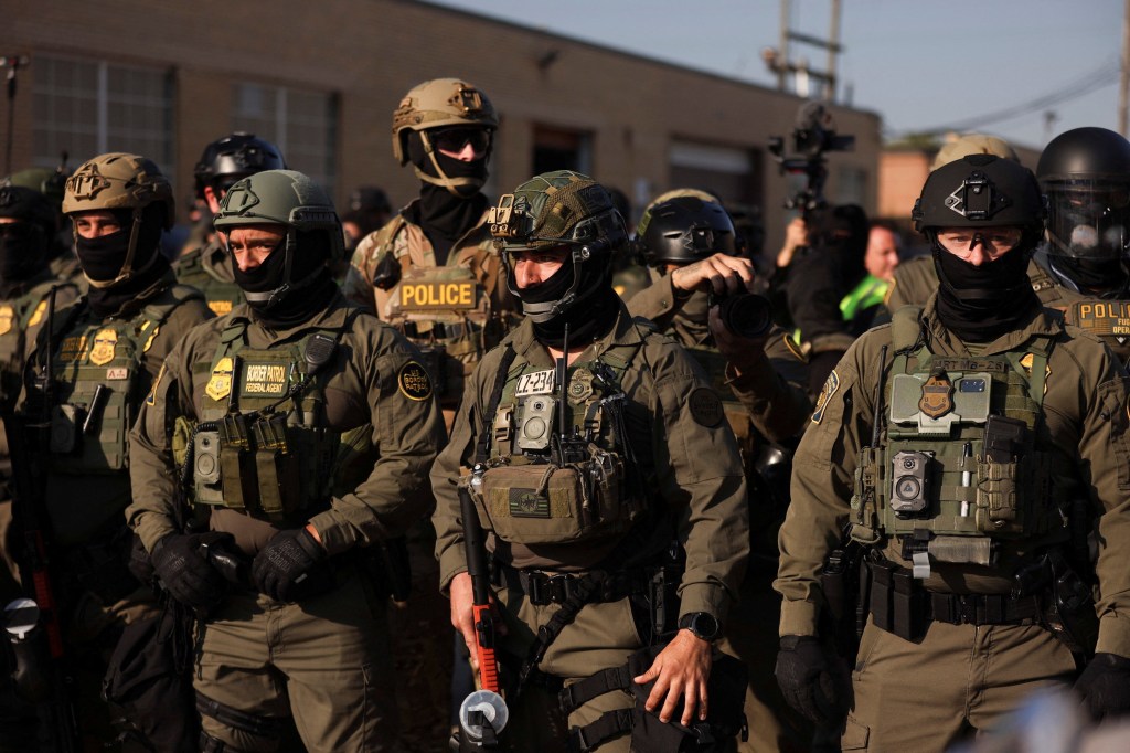 Border Patrol federal agents in tactical gear.
