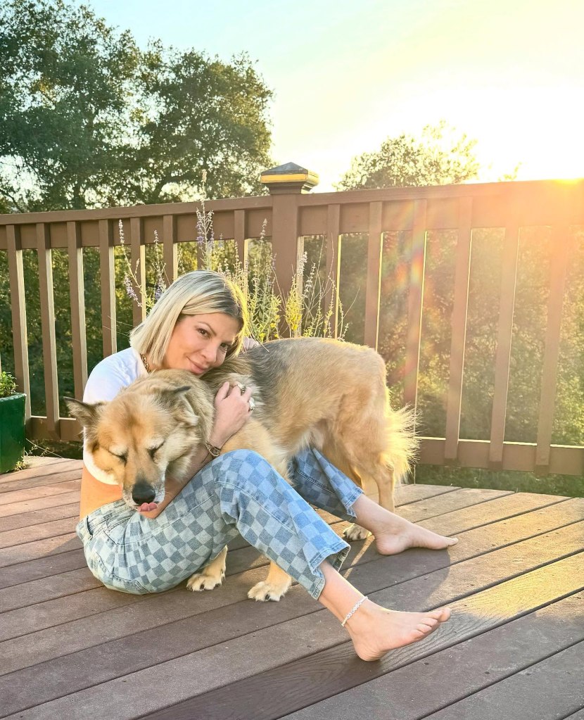 He’s 90210-dorable! Tori Spelling gets in some quality cuddle time with her pooch, Monty.
