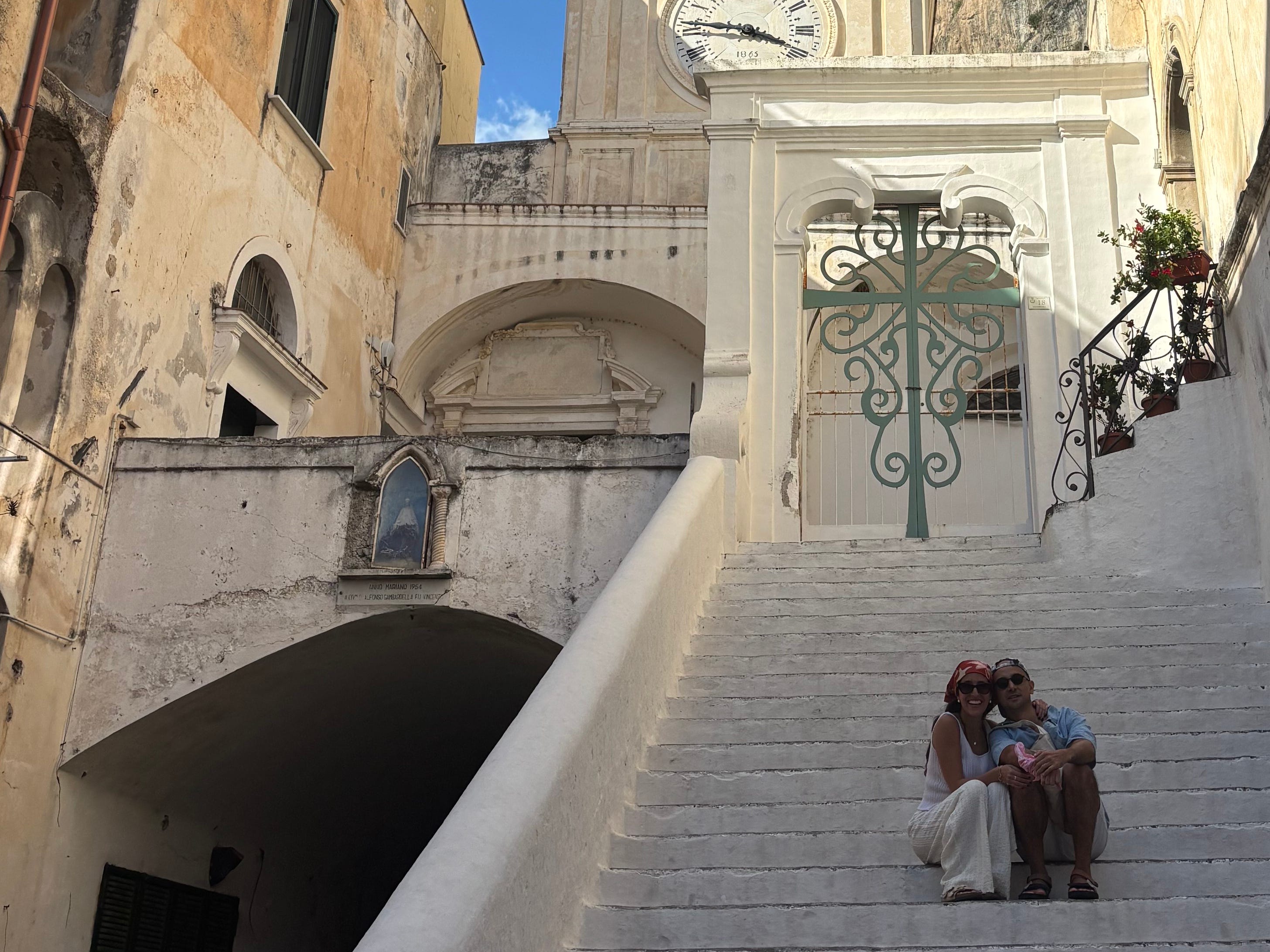 Santiago Barraza Lopez and his partner on steps in italy