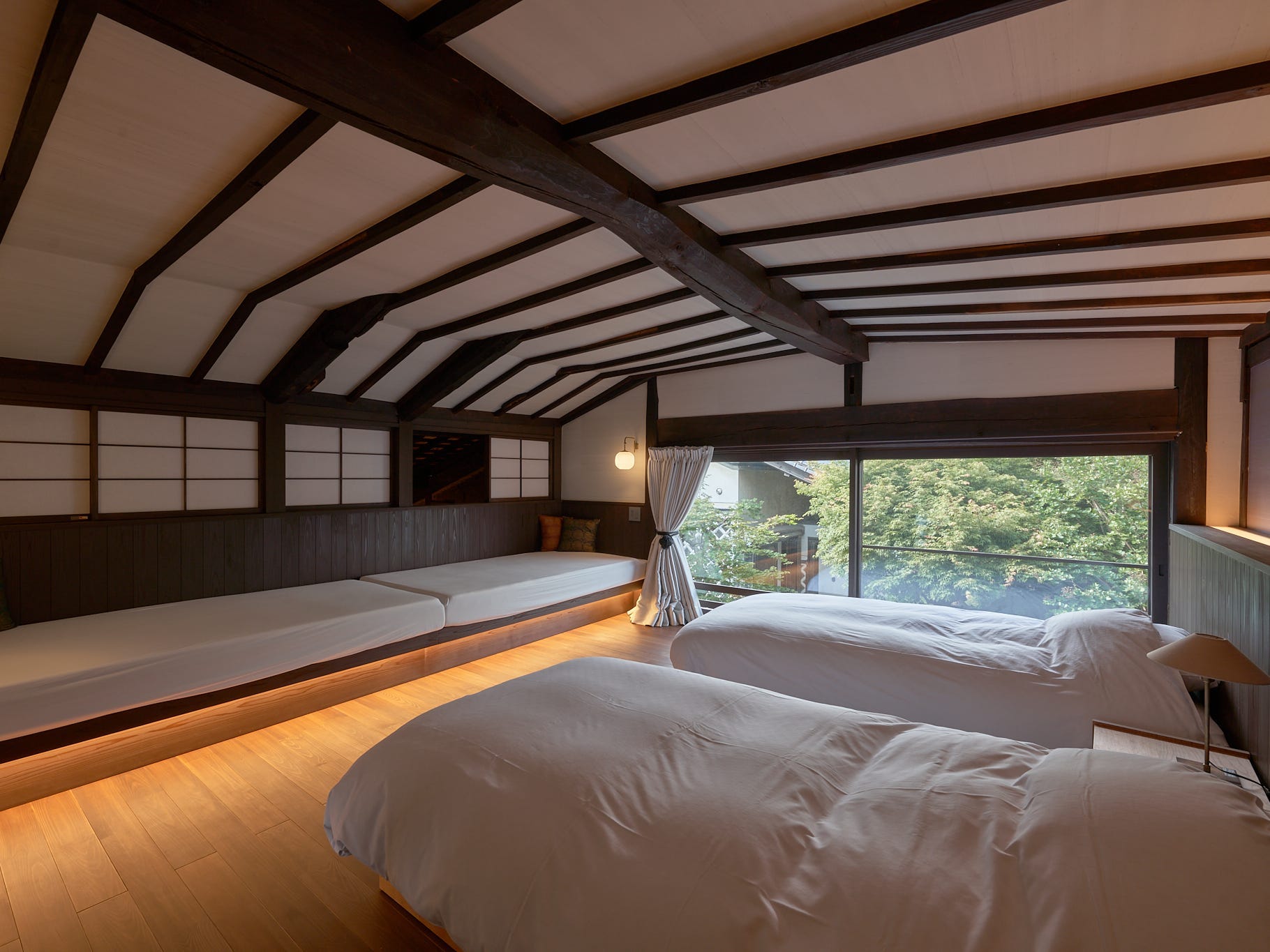 A bedroom on the second floor of the house.