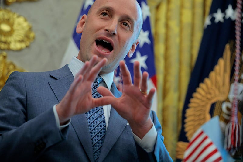White House Deputy Chief of Staff Stephen Miller talks to reporters during an Oval Office availability with U.S. President Donald Trump on August 25, 2025 in Washington, DC. Furthering his federal takeover of the capital city’s law enforcement, Trump signed executive orders ending cashless bail in the District of Columbia, mandating prosecution for people who desecrate the American flag -- including by burning it -- and other orders. (Photo by Chip Somodevilla/Getty Images)