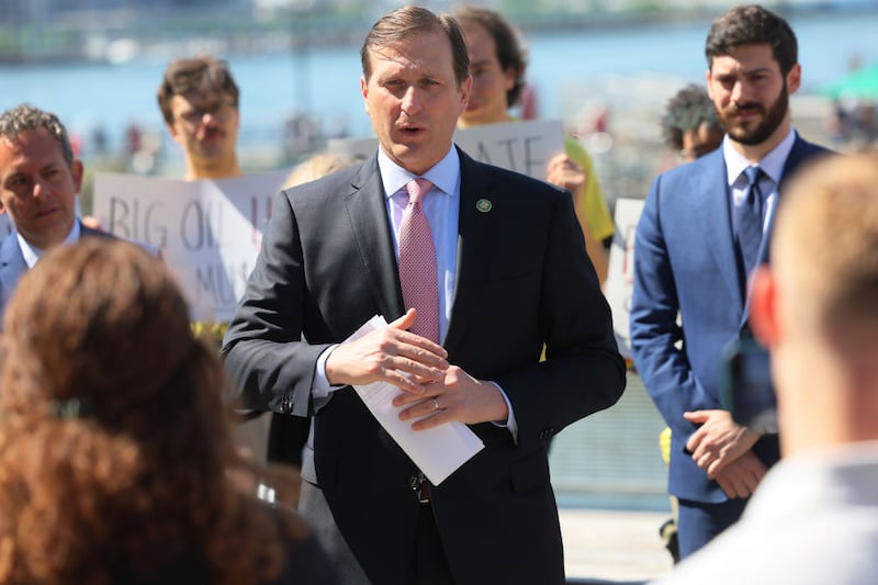 Rep. Daniel Goldman (D-NY) speaks during a press conference on the Climate Change Superfund Act at Pier 17 on May 26, 2023 in New York City. Rep. Goldman (D-NY) and Jerry Nadler (D-NY) were joined by state lawmakers, including State Sen. Liz Krueger the author of the Climate Change Superfund Act, and New York Public Interest Research Group Executive Director Blair Horner as they spoke of the importance of passing the bill to combat climate change and to make corporate polluters pay for the damages caused by climate change.  (Photo by Michael M. Santiago/Getty Images)