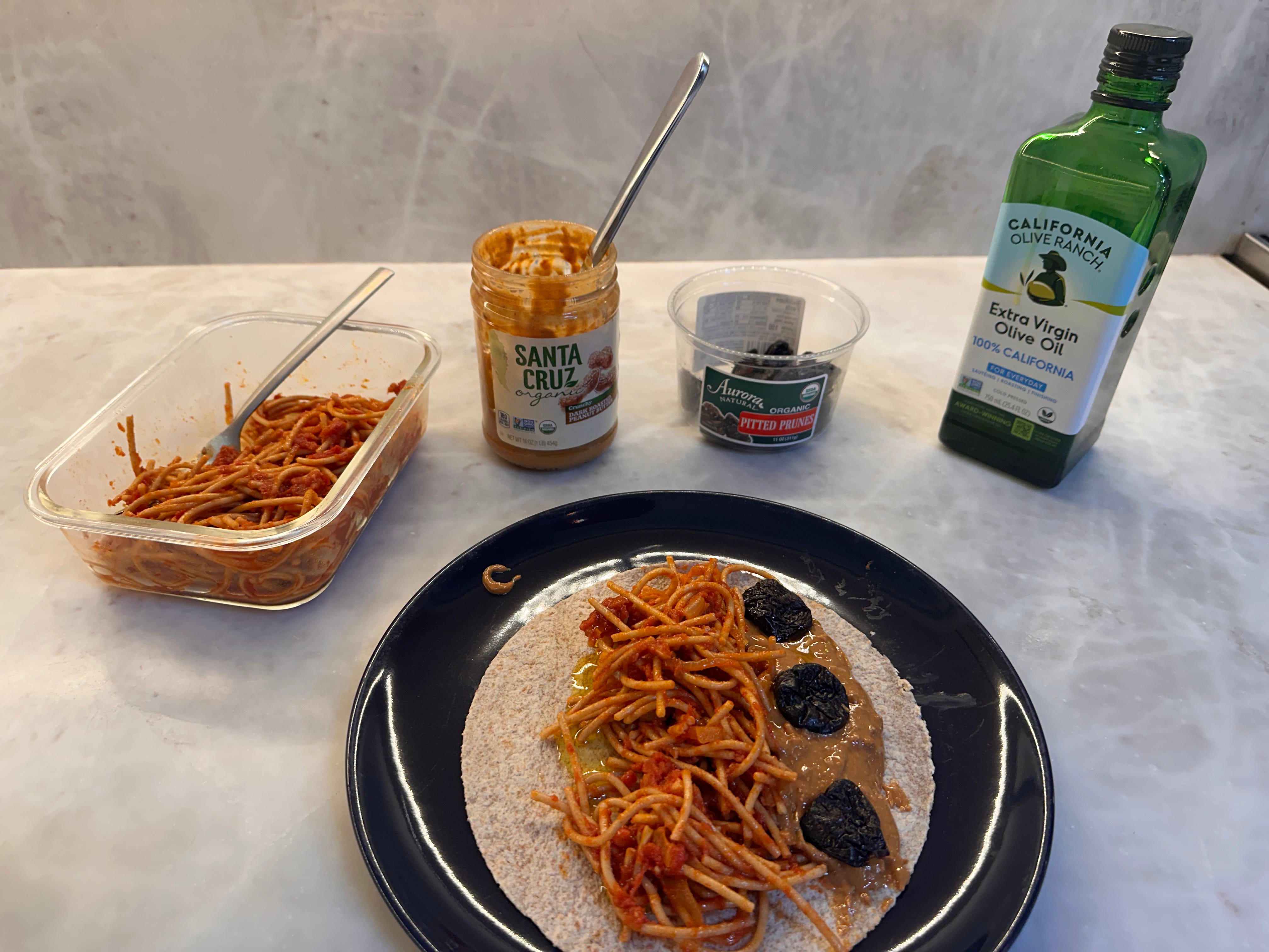 David Barnett lunch with spaghetti, peanut butter, prune, and olive oil