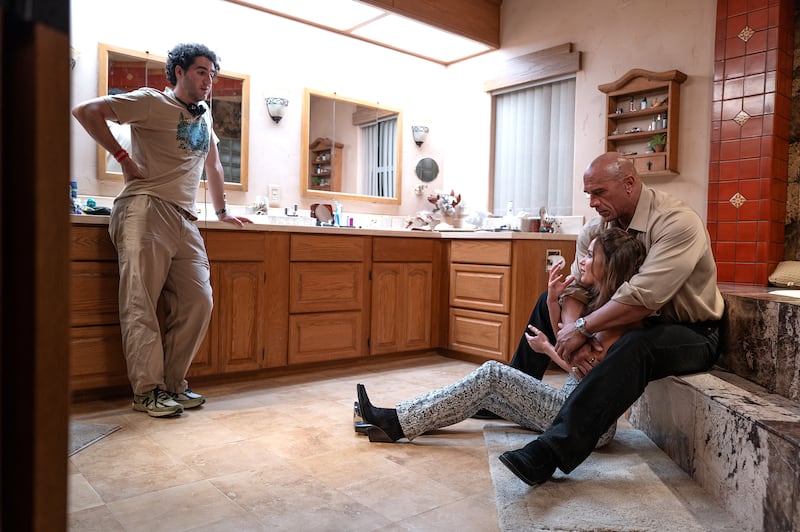 Benny Safdie, Emily Blunt, and Dwayne Johnson in The Smashing Machine.