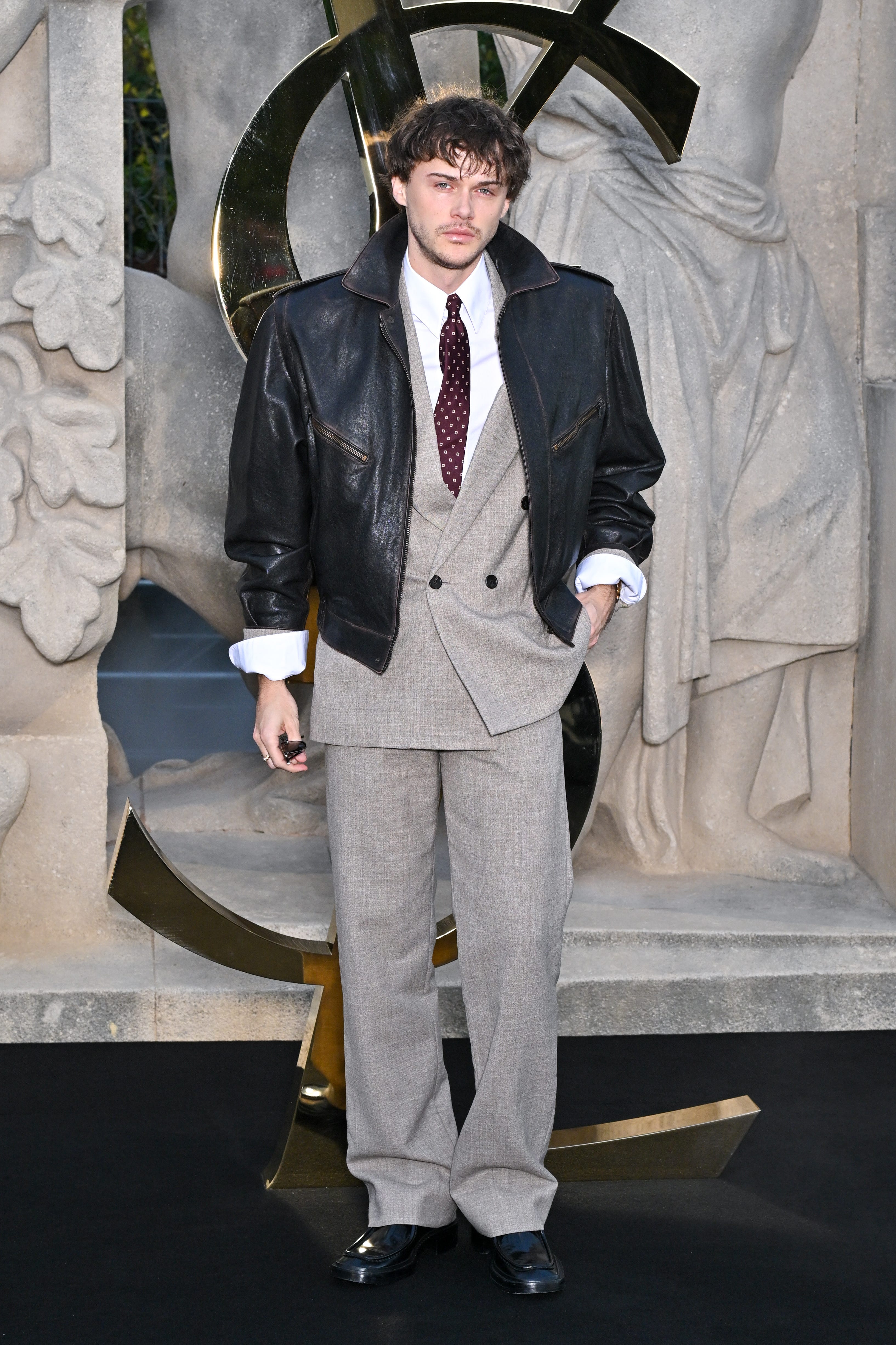 Christopher Briney at the Saint Laurent show during Paris Fashion Week.