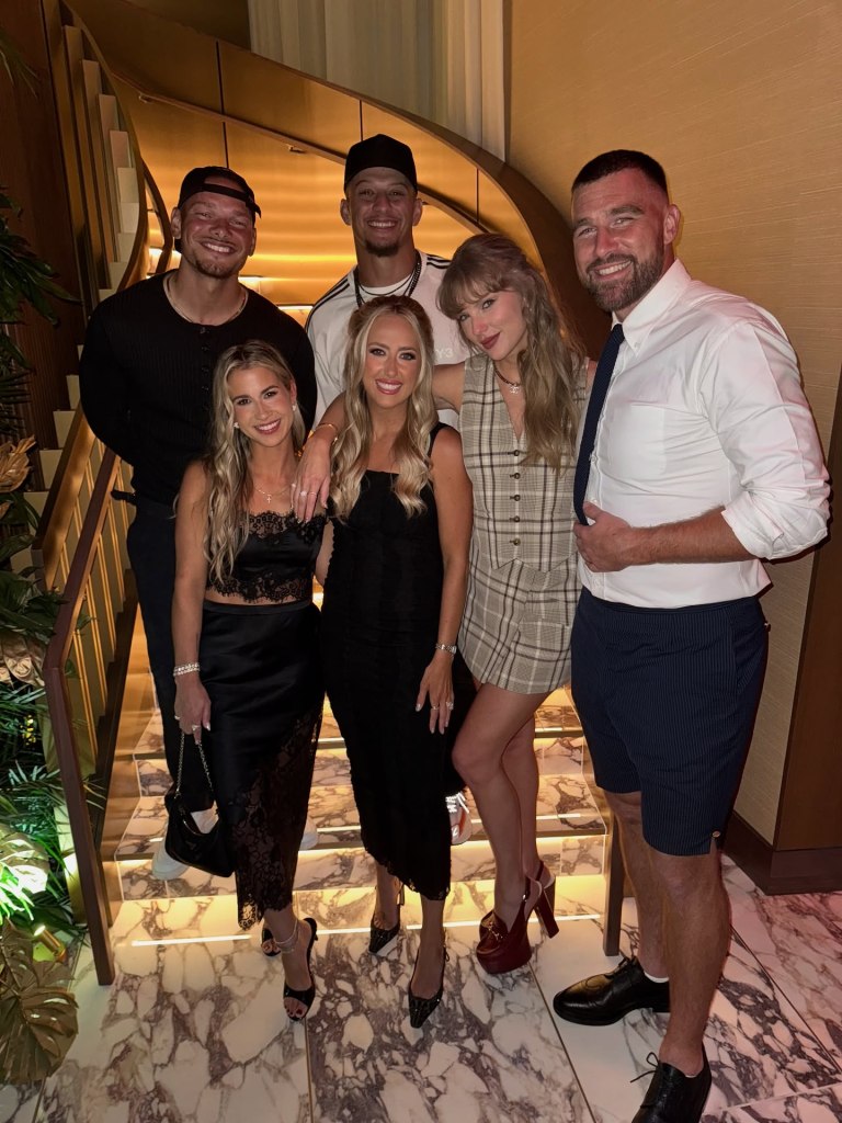 Kane Brown, Katelyn Brown, Patrick Mahomes, Brittany Mahomes, Taylor Swift, and Travis Kelce posing on a staircase.