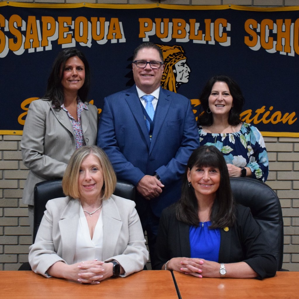 Massapequa School District's Board of Education official group portrait.