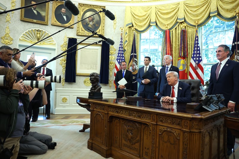 WASHINGTON, DC - OCTOBER 06: U.S. President Donald Trump, joined by Interior Secretary Doug Burgum (R), Energy Secretary Chris Wright and other Administration officials, speaks during an event in the Oval Office at the White House on October 06, 2025 in Washington, DC. Trump spoke on an executive order to increase the development and production of Alaska's natural resources.  (Photo by Anna Moneymaker/Getty Images)