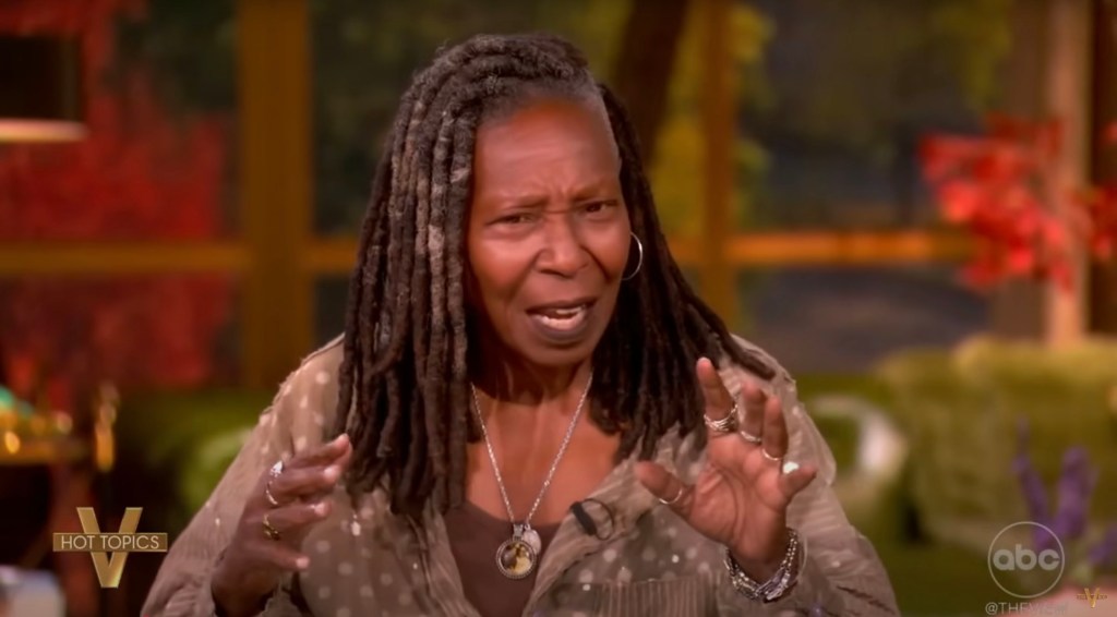 Whoopi Goldberg speaking on The View, gesturing with her hands.