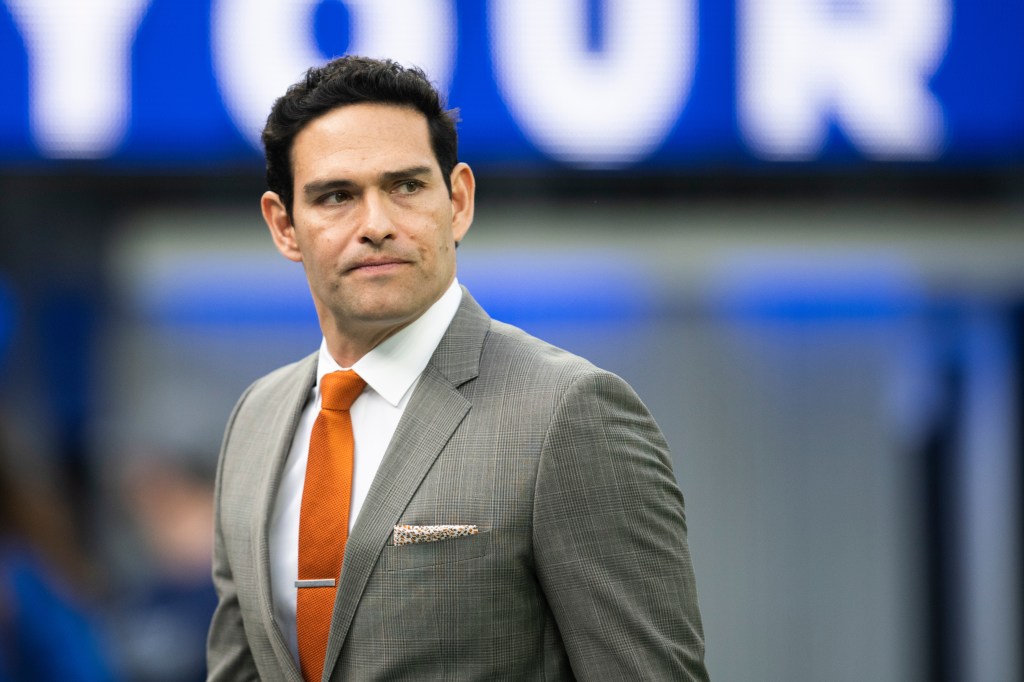 Mark Sanchez walks on the field before an NFL football game between the Los Angeles Rams and the Jacksonville Jaguars Sunday, Dec. 5, 2021, in Inglewood, Calif. 