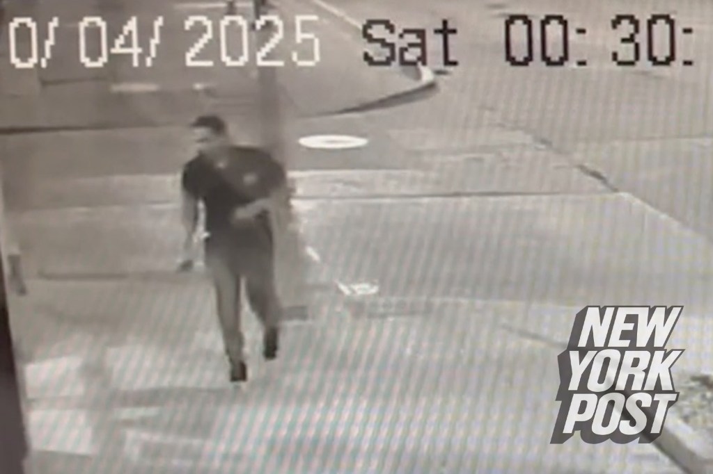 Mark Sanchez, seemingly with blood on his shirt, as he walks down a street in Indianapolis after allegedly stabbing a 69-year-old grease truck driver on October 4, 2025. 