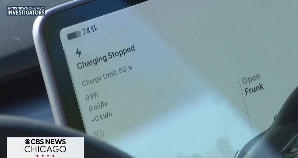 A close-up of a car's screen displaying 