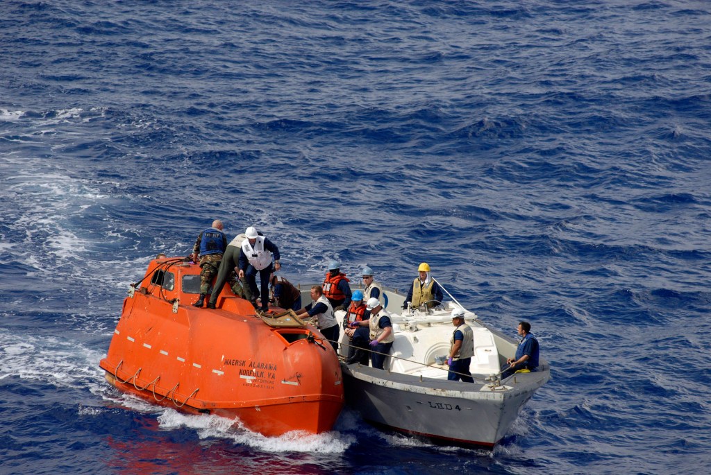 A team from the USS Boxer towing the lifeboat from the Maersk Alabama.