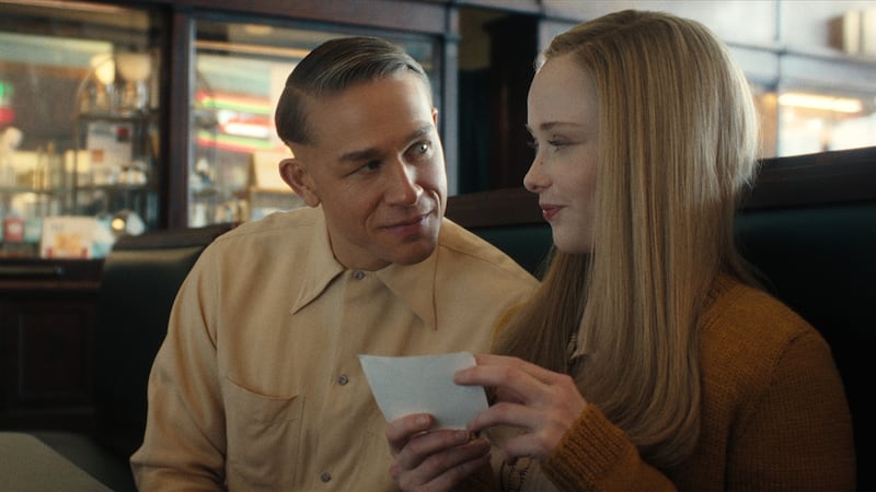 (L-R) Charlie Hunnam as Ed Gein and Suzanna Son as Adelina.