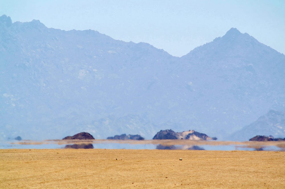 desert water mirage optical illusion