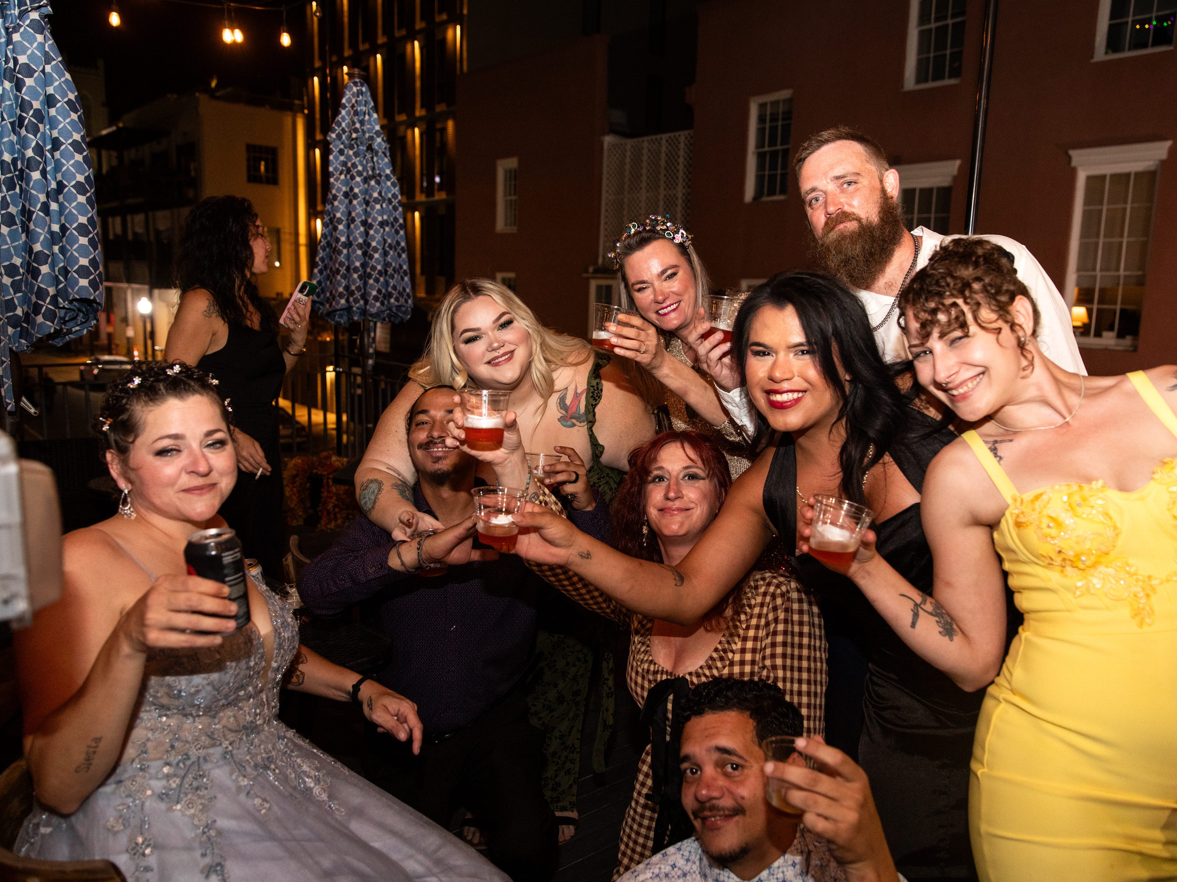 A group of friends making a toast at a party.