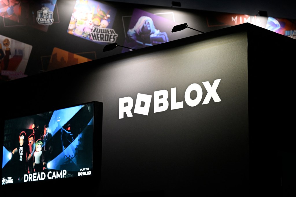 The Roblox logo displayed at their booth during the Gamescom video games trade fair.
