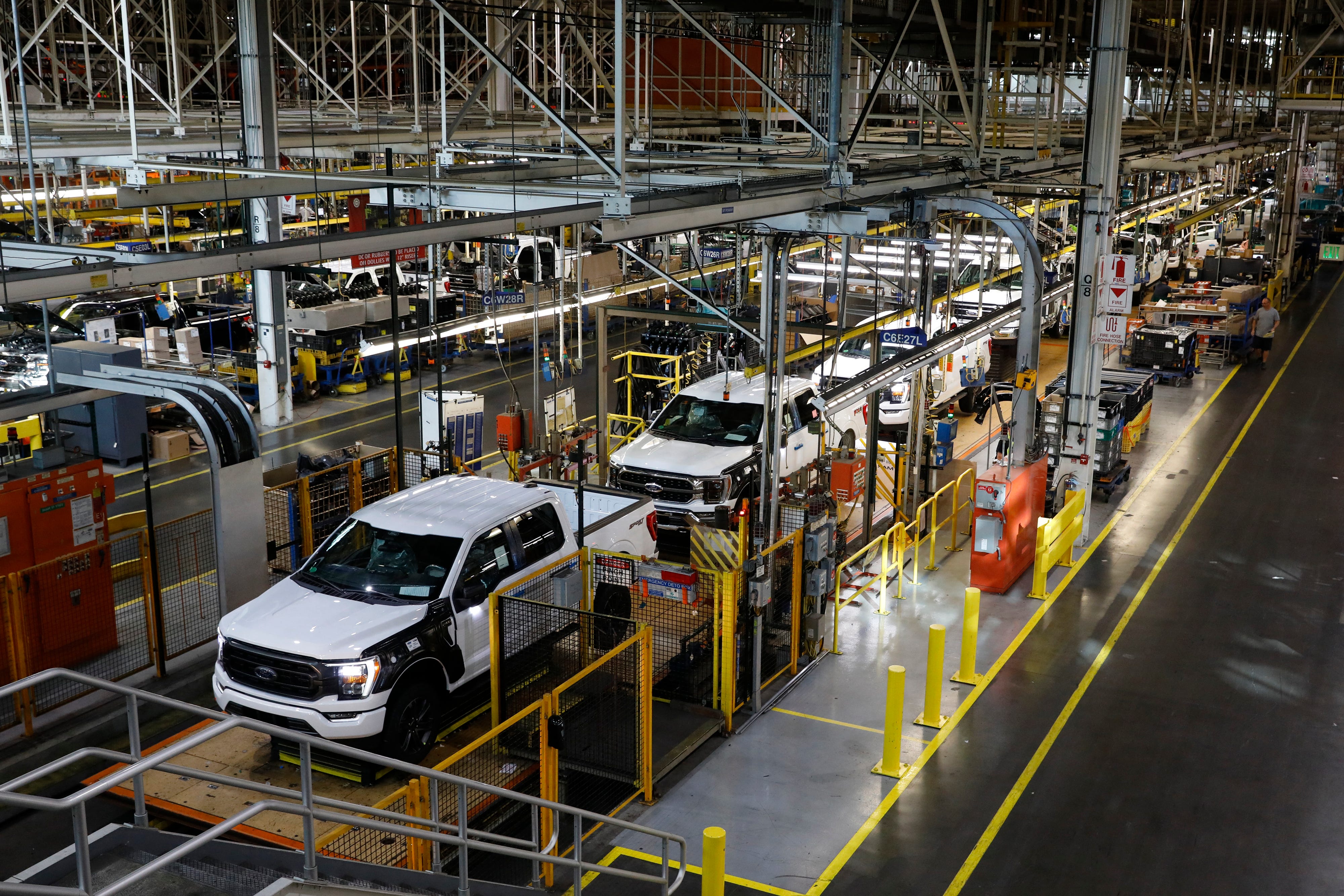 Ford F-150 trucks roll off the line at the company's plant in Dearborn, Michigan.