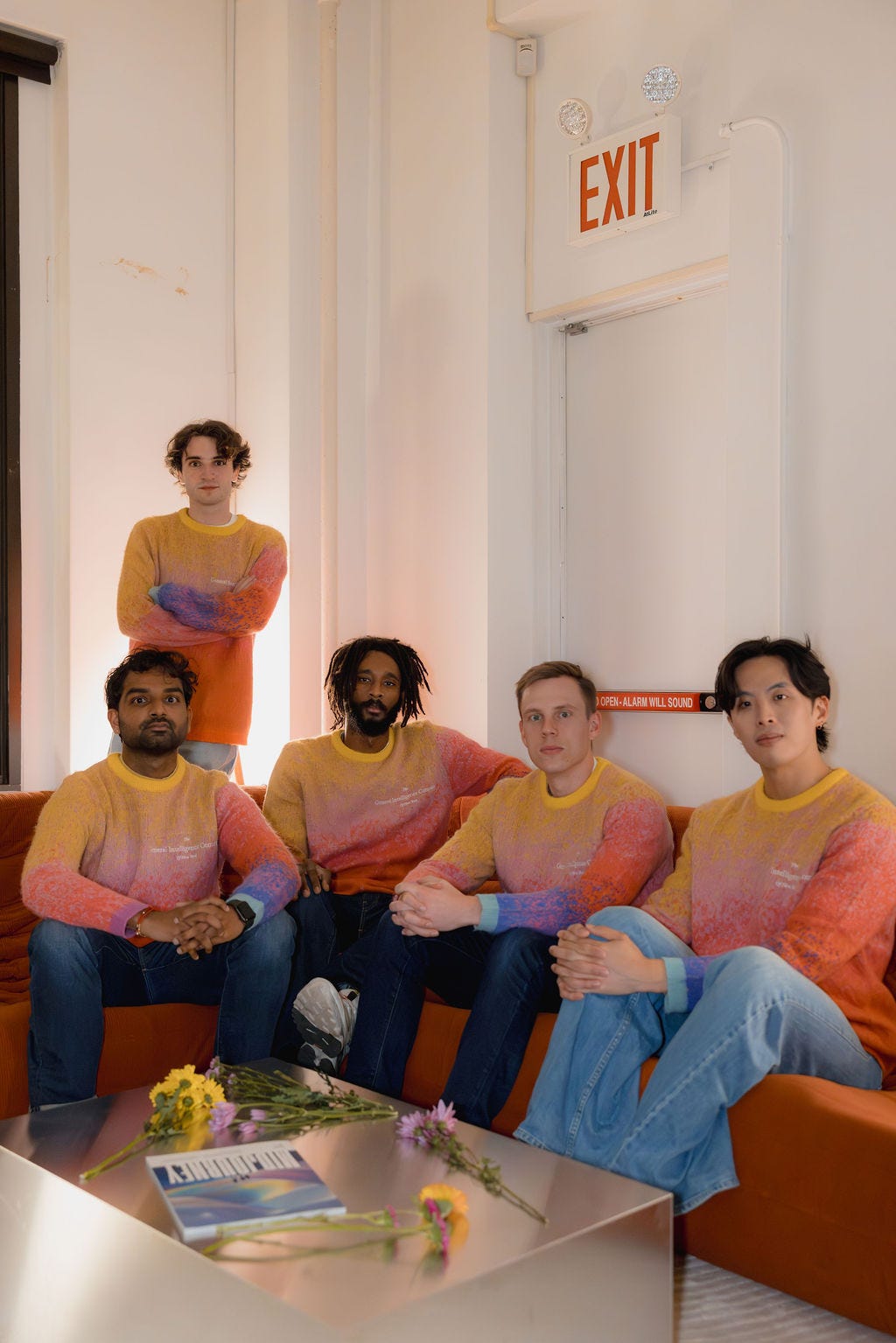 The General Intelligence Company of New York sweaters are pictured.
