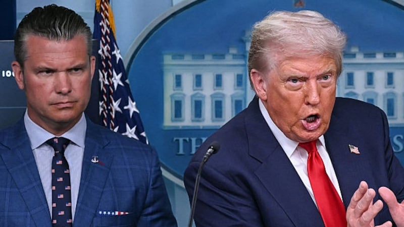 TOPSHOT - US President Donald Trump, alongside Secretary of Defense Pete Hegseth (L) and Attorney General Pam Bondi (R),  speaks during a news conference to discuss crime in Washington, DC, in the Brady Press Briefing Room at the White House in Washington, DC, on August 11, 2025. President Donald Trump announced Monday that he was deploying National Guard troops and putting the Washington police force under federal control to tackle crime in the US capital. 
