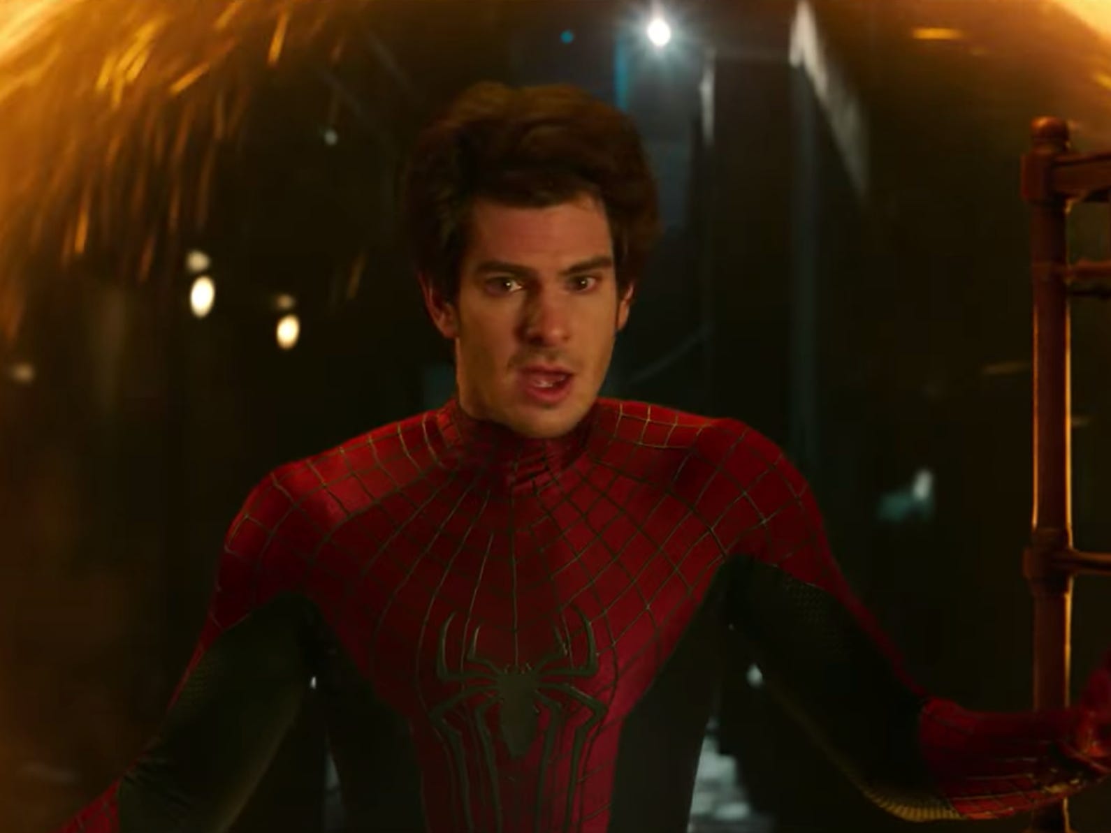 Andrew Garfield's version of Spider-Man emerging from a portal in 